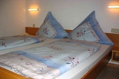 eines der Schlafzimmer eines der Schlafzimmer